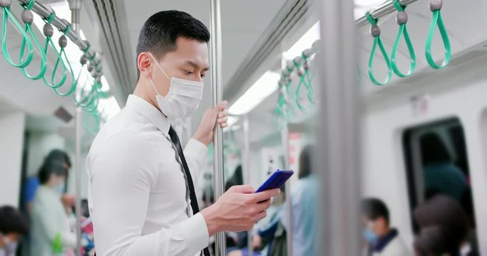 man with mask in mrt