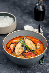 Tom yum soup with seafood rice in the decor
