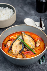 Tom yum soup with seafood rice in the decor