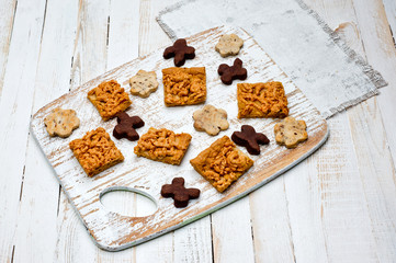 .Homemade shortbread cookies lying on a white painted wooden surface. Baking and cooking.