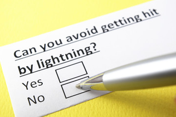 Obraz premium Can you avoid getting hit by lighting? Yes or no?