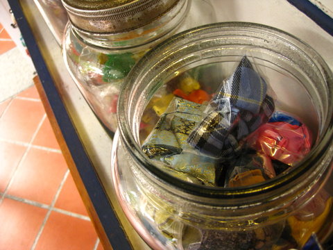 childhood toys in a jar
