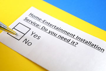 One person is answering question about home entertainment installation service.
