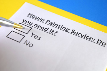 Obraz premium One person is answering question about house painting service.