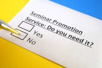 One person is answering question about seminar promotion service.