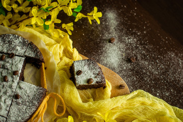 
Chocolate cupcake. Homemade pastries on a yellow background
