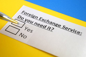 Obraz premium One person is answering question about foreign exchange service.
