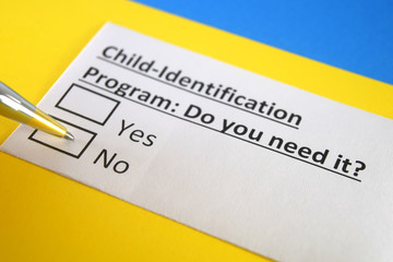 Obraz premium One person is answering question about child-identification program.