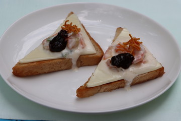 Vegetable Cheese toast, open sandwich topped with creamy salad