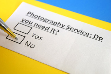 Obraz premium One person is answering question about photography service.