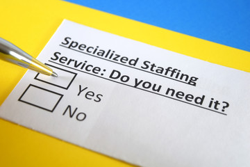 Obraz premium One person is answering question about specialized staffing service.