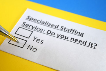 One person is answering question about specialized staffing service.