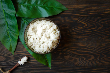 spiced rice bowl on wooden surface top view