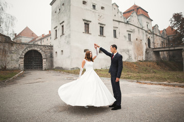 Beautiful wedding couple just married and dancing