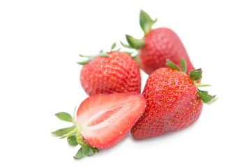 Ripe fresh organic strawberries isolated on white background.