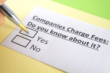 Obraz premium One person is answering question about companies charge fees.