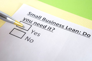Obraz premium One person is answering question about small business loan.