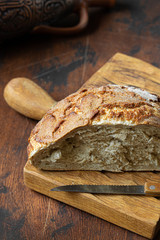 bread half on wooden table horizontal