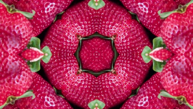 4K. Strawberry kaleidoscope, multi-colored strawberry mandala. Berry pattern, multi-colored fruits of a kaleidoscope, fruit and berry mosaic, artistic mandala. Background for the project.