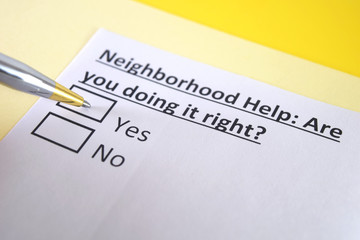 Obraz premium One person is answering question about neighborhood help.