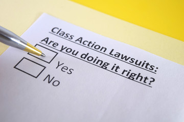 Obraz premium One person is answering question about class action lawsuits.