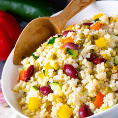 bulgur kaszotto with fresh vegetables and kidney bean