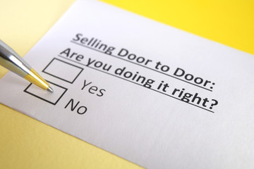 One person is answering question about selling door to door.
