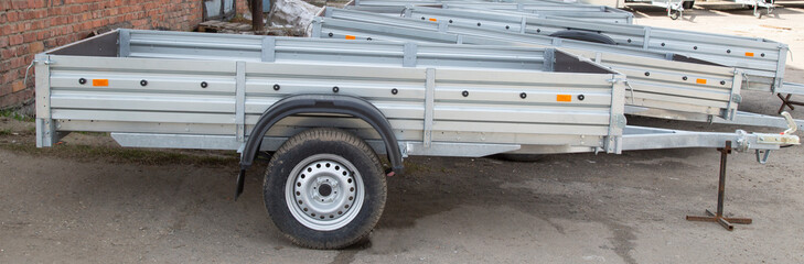 Open car trailer. Trailer for passenger cars.Sale, rental and maintenance of trailers.