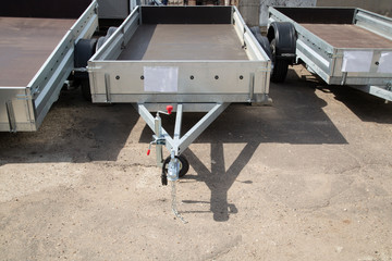 Open car trailer. Trailer for passenger cars.Sale, rental and maintenance of trailers.