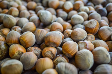 Organic hazelnuts close up background