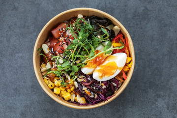 Traditional Hawaiian poke salmon dish in a cardboard box