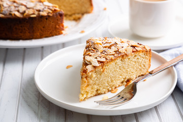 Delicious portion of almond and lemon cake with coffee
