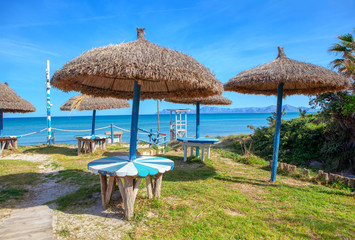 Fototapeta na wymiar parasols on tropical island beach