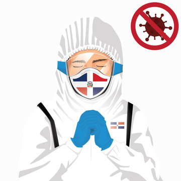 Covid-19 or Coronavirus concept. Dominican medical staff wearing mask in protective clothing and praying for against Covid-19 virus outbreak in Dominican Republic. Dominican man and flag. Pandemic
