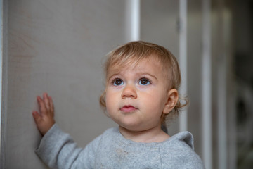 beautiful baby girl looking up
