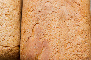 Freshly baked bread was baked at home in a bread maker