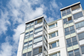 Fototapeta premium Modern Giant Apartment Building Blue Sky Facade Home Residential Structure