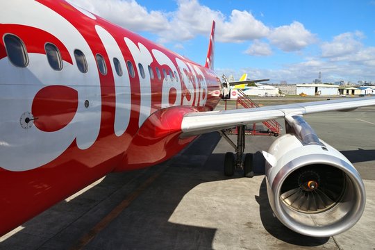 MANILA, PHILIPPINES - NOVEMBER 28, 2017: Air Asia Airbus A320 at Ninoy Aquino International Airport (NAIA), Manila. The airport handles 36.7 million passengers annually (2015).