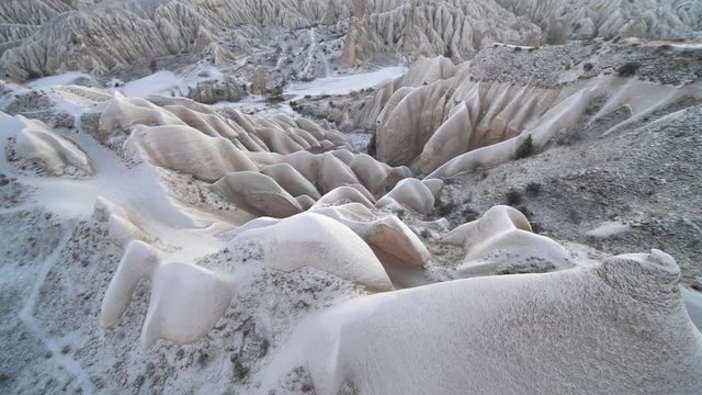 Volcanic rocks of Cappadocia in the winter in Turkey. Aerial view.