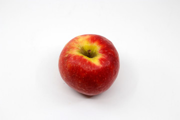 Fototapeta na wymiar Isolated red apple in white background
