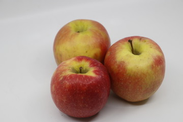 Red apples in white background