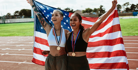 American athletes celebrating a sports event victory