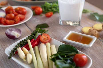 Cooking tom yam soup at home. Ingredients for Thai Tom Kung Soup. Thailand meal. Healthy food. Exotic food. Traditional dinner. Top view.