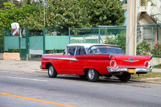 HAVANA - FEBRUARY 24: Classic American Ford car in Havana. Recent change in law allows the Cubans to trade cars again. Old law resulted in very old fleet of private owned cars in Cuba.