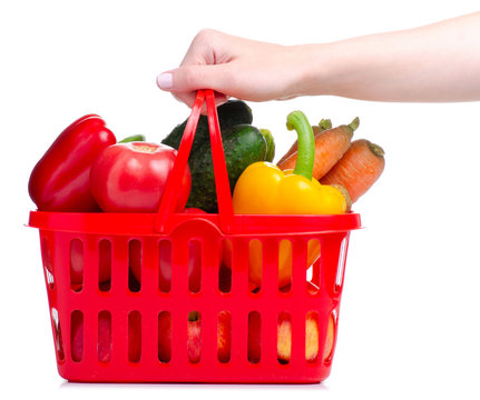 Red Grocery Basket With Vegetables And Fruit In Hand On White Background Isolation