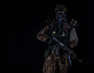 Naklejka premium Nuclear post apocalypse life after doomsday concept. Grimy survivor with homemade weapons. Studio portrait