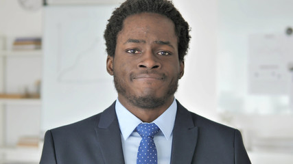 Denying African Businessman Shaking Head