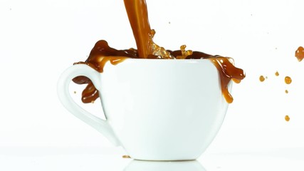 Super slow motion of falling sugar cubes into coffee cup, on white background. Filmed on high speed cinema camera Phantom VEO 4k, 1000fps. - Powered by Adobe