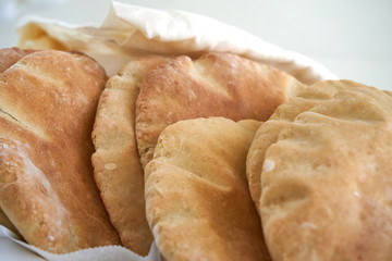 Pita bread on a white background - fresh baked gluten-free pita bread