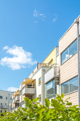Fototapeta na wymiar Modern Luxury Scandinavia Apartment Building Blue Sky Facade Home Residential Structure